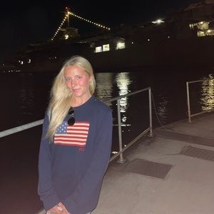 Blue crew-neck sweater with flag